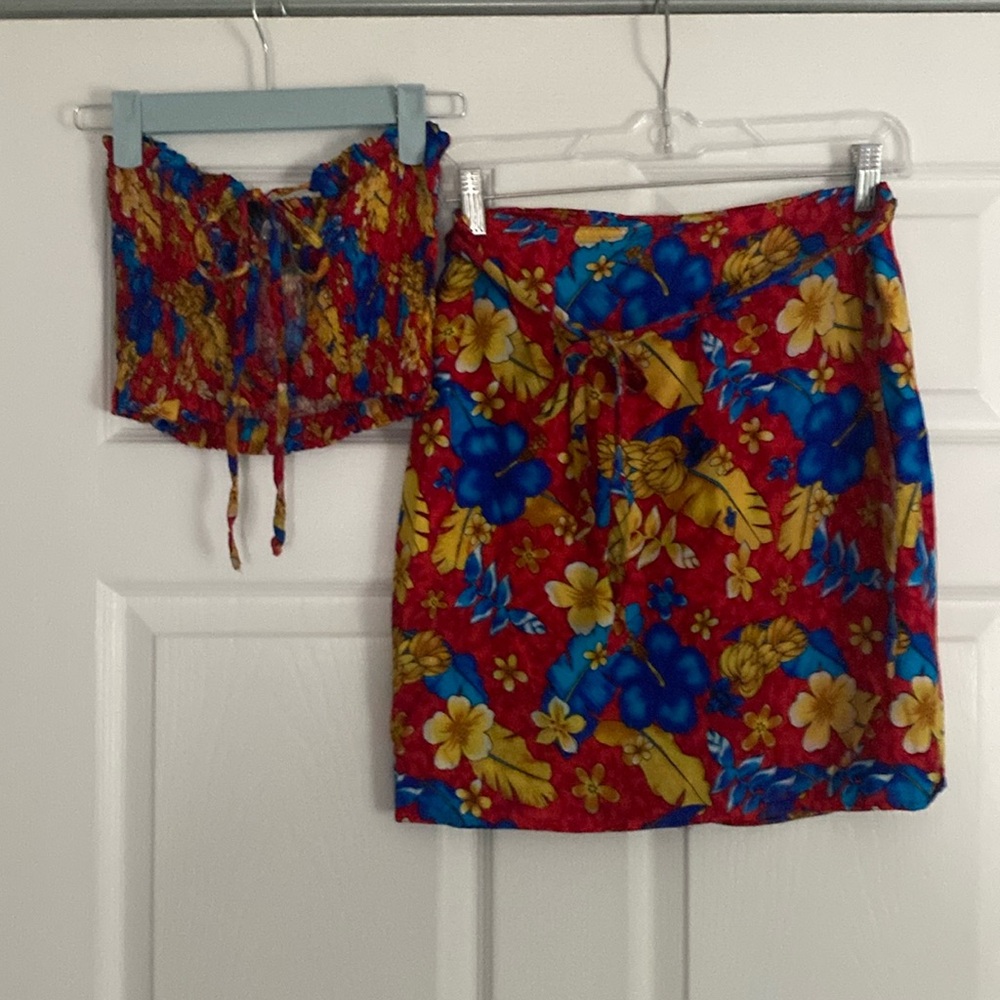 2pc set. Wrap around mini skirt with tube top.